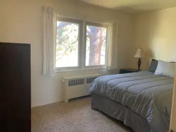 Chapel Single-level bedroom with carpet