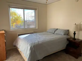 Tres Casitas bedroom with carpet