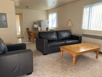 Tres Casitas living room to dining room with carpet