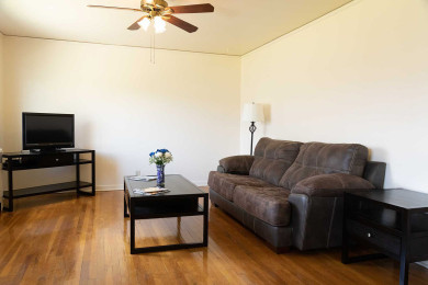 Tres Casitas living room with wood floor